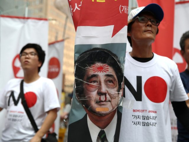 SEOUL, SOUTH KOREA - AUGUST 03: South Korean protesters participate in a rally to denounce