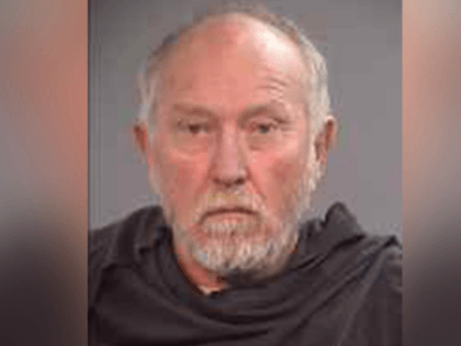 Authorities say John Tobe Larson, 68, offered an informant $20,000 to kill the associate,