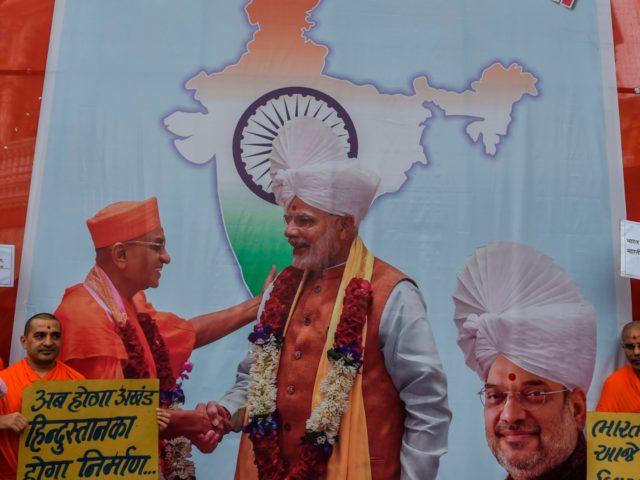 Saints from the spiritual centre 'Maninagar Shree Swaminarayan Gadi Sansthan' and school c