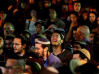 Relatives and friends mourn during the funeral of 19-year-old Israeli soldier Dvir Sorek at a cemetery the Jewish settlement of Ofra, in the occupied West Bank, on August 8, 2019. - An off-duty Israeli soldier was found dead with stab wounds near a Jewish settlement in the occupied West Bank …