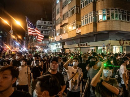HONG KONG, CHINA - AUGUST 14: Protesters take part in a demonstration on Hungry Ghost Festival day in Sham Shui Po district on August 14, 2019 in Hong Kong, China. Pro-democracy protesters have continued rallies on the streets of Hong Kong against a controversial extradition bill since 9 June as …