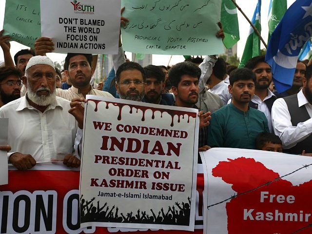 Supporters of the religious group Jamaat-e-Islami attend a rally to protest India's policy