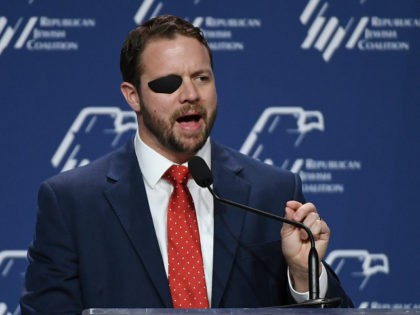LAS VEGAS, NEVADA - APRIL 06: U.S. Rep. Dan Crenshaw (R-TX) speaks at the Republican Jewish Coalition's annual leadership meeting at The Venetian Las Vegas after appearances by U.S. President Donald Trump and Vice President Mike Pence on April 6, 2019 in Las Vegas, Nevada. Trump has cited his moving …
