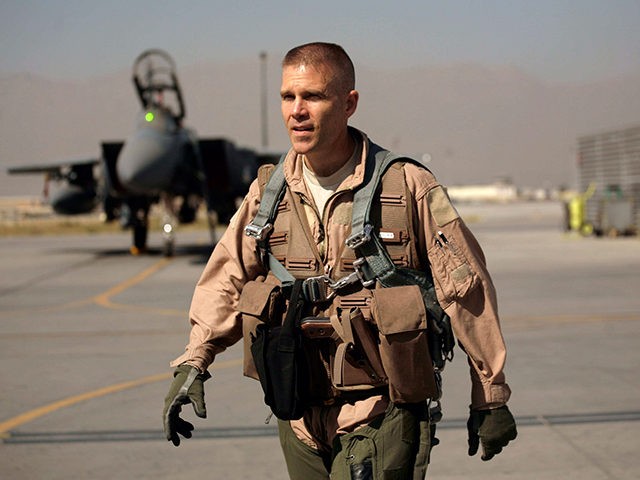 In this picture taken Saturday, Oct. 17, 2009, U.S. Air Force Brig. Gen. Steven Kwast, commander of the 455th Air Expeditionary Wing, walks on the flight line before piloting an F-15E Strike Eagle at Bagram Air Field in Afghanistan. Kwast is the top U.S. Air Force officer at this sprawling …