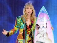 HERMOSA BEACH, CALIFORNIA - AUGUST 11: Taylor Swift accepts the Teen Choice Icon Award onstage during Fox's Teen Choice Awards at the Hermosa Beach Pier on August 11, 2019 in Hermosa Beach, California. (Photo by Kevin Winter/Getty Images)