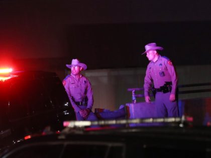 EL PASO, TEXAS - AUGUST 03: Police keep watch outside Walmart near the scene of a mass shooting which left at least 20 people dead on August 3, 2019 in El Paso, Texas. A 21-year-old male suspect was taken into custody in the city which sits along the U.S.-Mexico border. …
