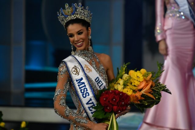Thalia Olvino, a 19-year-old marketing student, was crowned Miss Venezuela in Caracas First Miss Venezuela crowned after ditching contestants' measurements