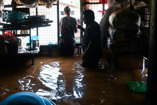 Tens of thousands flee homes in flood-hit Myanmar as landslide toll hits 59
