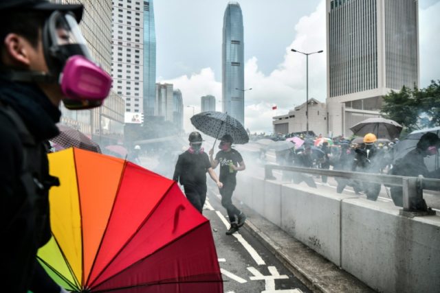 Police Fire Water Cannon Tear Gas To Clear Hk Protesters From