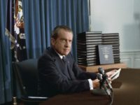 President Nixon with his edited transcripts of the White House Tapes subpoenaed by the Special Prosecutor, during his speech to the Nation on Watergate