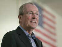 New Jersey Gov. Phil Murphy speaks during a bill signing ceremony in Berkeley Heights, N.J., Tuesday, July 16, 2019. Murphy has signed a measure aimed at making so-called smart guns available in the state. He also signed three other measures aimed at reining in gun violence. (AP Photo/Seth Wenig)