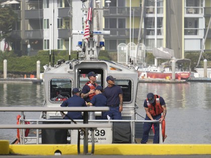 Coast Guard crews leave the U.S. Coast Guard Station Channel Islands in Oxnard, Calif., Monday, Sept. 2, 2019. Authorities have recovered the bodies of several people who died after a raging fire swept through a dive-boat, which sank off the Southern California coast Monday. (AP Photo/Ringo H.W. Chiu)