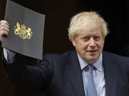 Britain's Prime Minster Boris Johnson leaves 10 Downing Street for Parliament in London, Wednesday, Sept. 25, 2019. British Attorney General Geoffrey Cox accused Parliament on Wednesday of being a "disgrace" as lawmakers returned for the first day of work since a bombshell court decision deemed Prime Minister Boris Johnson's suspension …