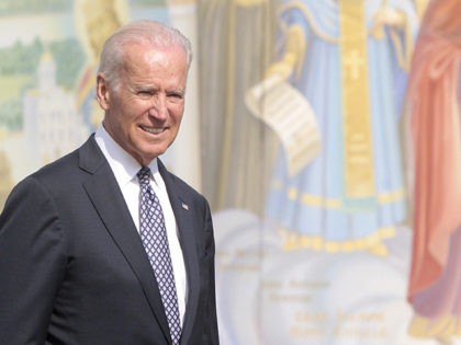 U.S. Vice President Joe Biden walks near St. Michael's Cathedral in Kiev, Ukraine, Tuesday