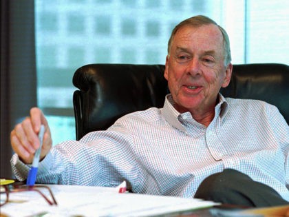 Corporate raider Boone Pickens, CEO and Chairman of the Board of Mesa Inc., sits in his Irving, Texas, office, July 29, 1996. Pickens is retiring from Mesa as soon as a new CEO is found to replace him. (AP Photo/Victoria Arocho)