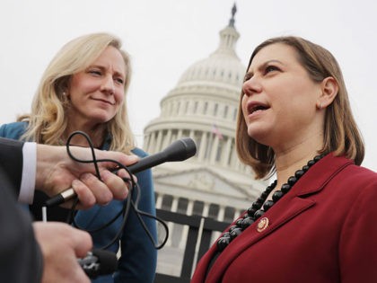 WASHINGTON, DC - JANUARY 04: Rep. Abigail Spanberger (R-VA) (L) and Rep. Elissa Slotkin (D-MI), both former CIA analysts, talk with reporters after a portrait with their fellow House Democratic women in front of the U.S. Capitol January 04, 2019 in Washington, DC. The 116th Congress has the biggest number …