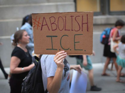 CHICAGO, IL - AUGUST 16: Demonstrators march through downtown calling for the abolition of the U.S. Immigration and Customs Enforcement (ICE) on August 16, 2018 in Chicago, Illinois. The demonstrators were also calling for defunding local police. (Photo by Scott Olson/Getty Images)