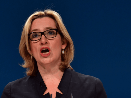 BIRMINGHAM, ENGLAND - OCTOBER 04: Home Secretary, Amber Rudd, delivers a her first speech as Home Secretary on the third day of the Conservative Party Conference 2016 at the International Conference Centre on October 4, 2016 in Birmingham, England. Ministers and senior Party members will address delegates throughout the day …