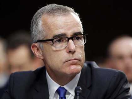 FBI acting director Andrew McCabe listens during a Senate Intelligence Committee hearing a