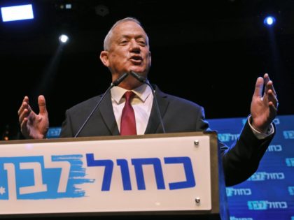 TOPSHOT - Benny Gantz, leader and candidate of the Israel Resilience party that is part of the Blue and White (Kahol Lavan) political alliance, addresses supporters at the alliance's campaign headquarters in the Israeli coastal city of Tel Aviv early on September 18, 2019. - Israeli Prime Minister Benjamin Netanyahu …