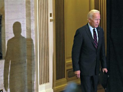 Democratic presidential hopeful Joe Biden arrives to make a statement on Ukraine during a