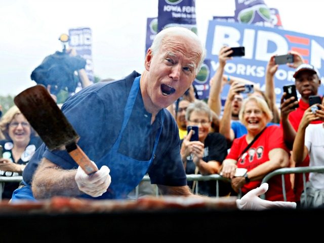 Democratic presidential candidate former Vice President Joe Biden works the grill during the Polk County Democrats Steak Fry, Saturday, Sept. 21, 2019, in Des Moines, Iowa. (AP Photo/Charlie Neibergall)
