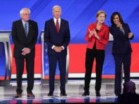 Democratic presidential hopefuls (L-R) Mayor of South Bend, Indiana, Pete Buttigieg, Vermont Senator Bernie Sanders, Former Vice President Joe Biden, Massachusetts Senator Elizabeth Warren and California Senator Kamala Harris arrive on stage for the third Democratic primary debate of the 2020 presidential campaign season hosted by ABC News in partnership …