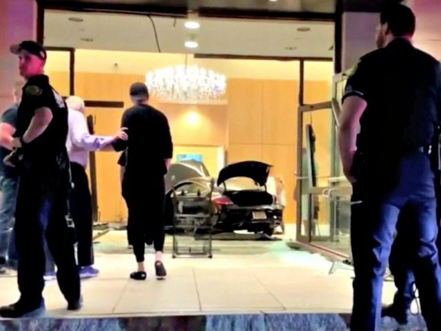 Car Crashes into Trump Hotel