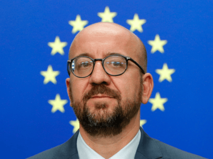 TOPSHOT - Belgium's Prime Minister Charles Michel looks on as he addresses the media after the EU leaders struck a deal on the bloc's top jobs during the third day of a EU summit, in Brussels on July 2, 2019. - EU leaders on July 2 neared a hard-fought summit …