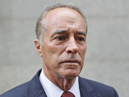 U.S. Rep. Chris Collins, R-N.Y., speaks to reporters as he leaves the courthouse after a pretrial hearing in his insider-trading case, Thursday, Sept. 12, 2019, in New York. (AP Photo/Seth Wenig)