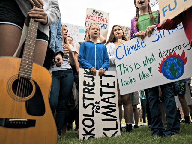 WASHINGTON, DC - SEPTEMBER 13: Teenage Swedish climate activist Greta Thunberg joins stude