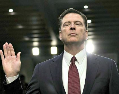 Former FBI Director James Comey is sworn in during a hearing before the Senate Select Comm