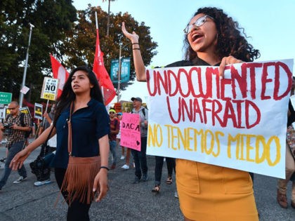 Young immigrants, activists and supporters of the DACA program march through downtown Los Angeles, California on September 5, 2017 after the Trump administration formally announced it will end the DACA (Deferred Action for Childhood Arrivals) program, giving Congress six months to act.