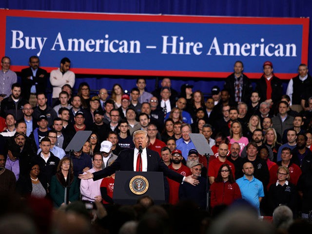 YPSILANTI, MI- MARCH 15: U.S. President Donald Trump speaks to auto workers at the American Center for Mobility March 15, 2017 in Ypsilanti, Michigan. Trump discussed his priorities of improving conditions to bolster the manufacturing industry and reduce the outsourcing of American jobs. (Photo by Bill Pugliano/Getty Images)
