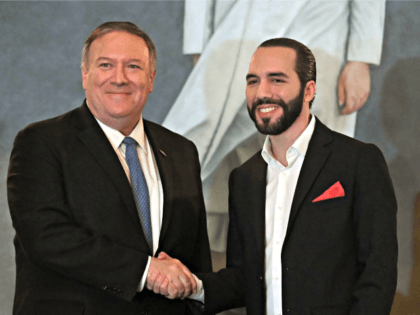 US Secretary of State Mike Pompeo shakes hands with Salvadorean President Nayib Bukele (R) after signing bilateral agreements at the presidential residence in San Salvador on July 21, 2019. (Photo by MARVIN RECINOS / AFP) (Photo credit should read MARVIN RECINOS/AFP/Getty Images)