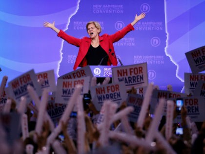 Democratic presidential candidate Sen. Elizabeth Warren, D-Mass., acknowledges the applause as she arrives on stage to speak at the New Hampshire state Democratic Party convention, Saturday, Sept. 7, 2019, in Manchester, NH. (AP Photo/Robert F. Bukaty)