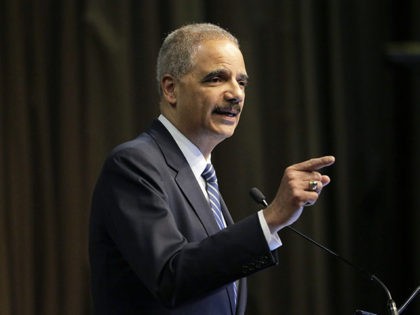 Former U.S. Attorney General Eric Holder, Jr. speaks during the National Action Network Convention in New York, Wednesday, April 3, 2019. (AP Photo/Seth Wenig)