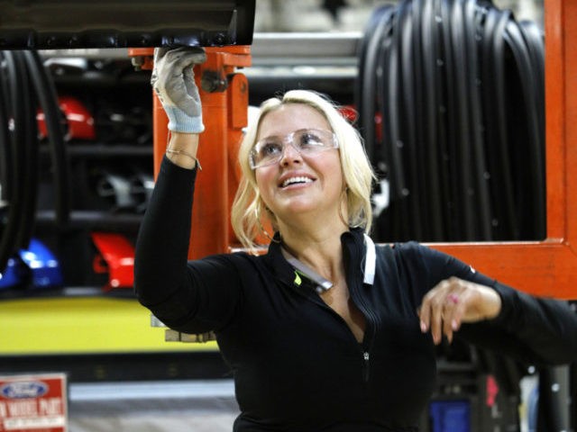 DEARBORN, MI - SEPTEMBER 27: Ford Motor Company worker Nikki Hughs works on a Ford F150 truck on the high-line at the Ford Dearborn Truck Plant on September 27, 2018 in Dearborn, Michigan. The Ford Rouge Plant is celebrating 100 years as America's longest continuously operating auto plant. The factory …