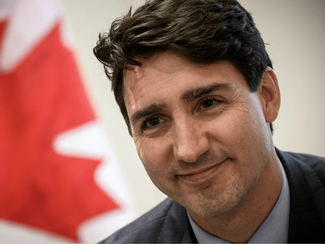 Canadian Prime Minister Justin Trudeau looks on during an interview at the Canadian Embassy in Paris on November 12, 2018. - Canadian Prime Minister Justin Trudeau said on November 12, 2018 that his government was holding talks with Pakistan over potentially offering asylum to Asia Bibi, a Christian woman recently …
