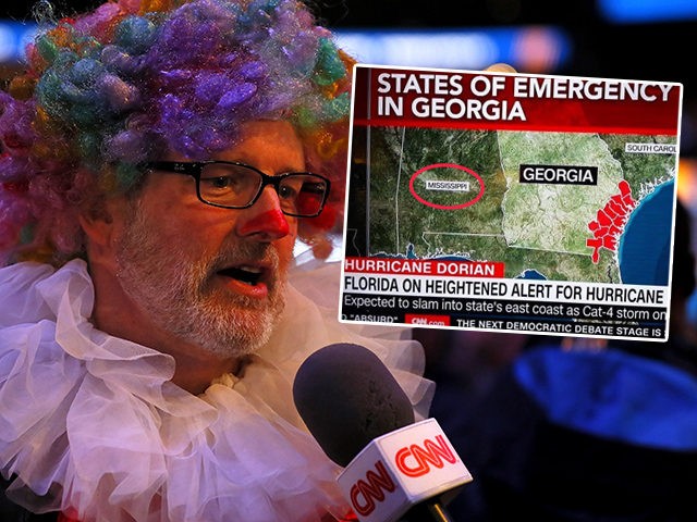 (INSET: A CNN map mis-identifying Alabama as Mississippi) ATLANTA, GEORGIA - JANUARY 28: A member of the media answers questions from CNN during Super Bowl LIII Opening Night at State Farm Arena on January 28, 2019 in Atlanta, Georgia. (Photo by Kevin C. Cox/Getty Images)