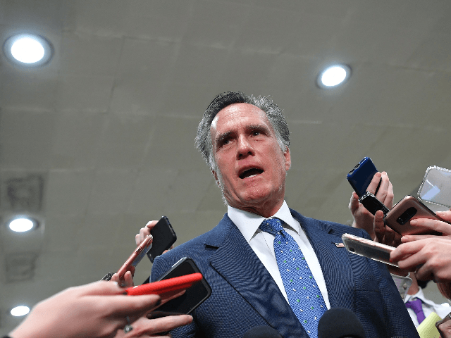 US Senator Mitt Romney is surrounded by media after a closed-door briefing on Iran at the US Capitol in Washington, DC, on May 21, 2019. (Photo by MANDEL NGAN / AFP) (Photo credit should read MANDEL NGAN/AFP/Getty Images)