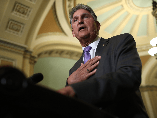 Sen. Joe Manchin (D-WV) answers questions at the U.S. Capitol on July 09, 2019 in Washington, DC. Senate Majority Leaders Chuck Schumer answered a range of questions during the press conference including queries on recent court cases involving the Affordable Care Act. (Photo by Win McNamee/Getty Images)