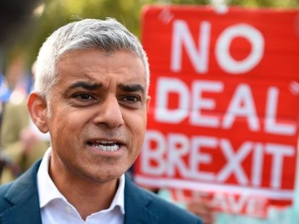 London Mayor Sadiq Khan speaks to the media as he arrives ahead of a cross-party rally org