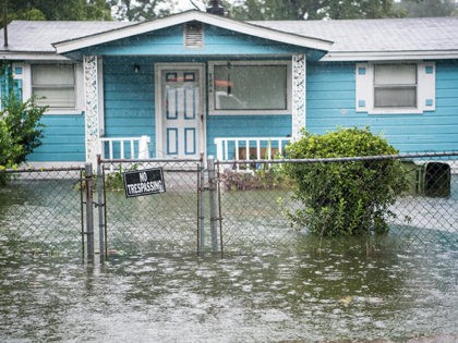 GEORGETOWN, SC - SEPTEMBER 5: Flood water accumulates in the front yard of a home on September 5, 2019 in Georgetown, South Carolina. Hurricane Dorian spins just off shore of the state and is forecasted to brush along the Outer Banks in North Carolina tomorrow morning. (Photo by Sean Rayford/Getty …