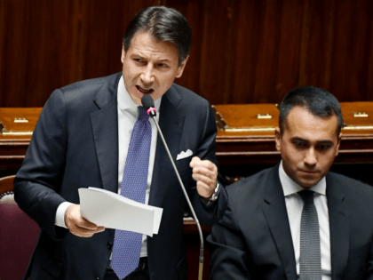 Italy's Prime Minister Giuseppe Conte (L) delivers a speech as Italy's Foreign Minister Luigi Di Maio looks on during the new government confidence vote on September 9, 2019 at the lower house of parliament in Rome. (Photo by Andreas SOLARO / AFP) (Photo credit should read ANDREAS SOLARO/AFP/Getty Images)