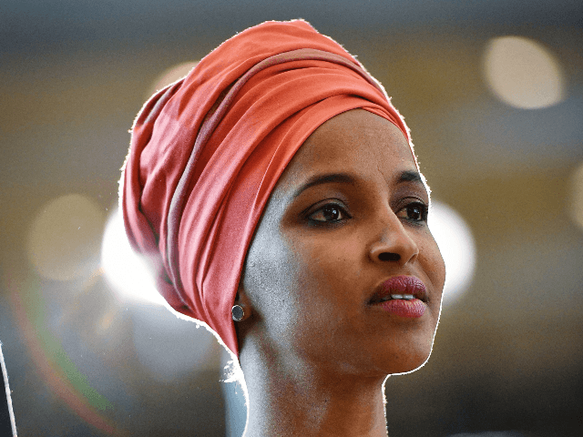 US Representative Ilhan Omar arrives for the Congressional Black Caucus (CBC) ceremony to commemorate the 400th anniversary of the first recorded forced arrival of enslaved Africans in the Emancipation Hall of the US Capitol in Washington, DC on September 10, 2019. (Photo by MANDEL NGAN / AFP) (Photo credit should …