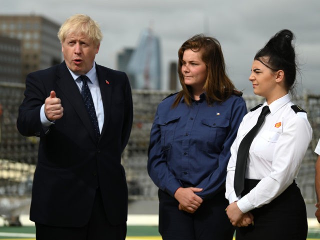 LONDON, ENGLAND - SEPTEMBER 12: U.K. Prime Minister Boris Johnson speaks to apprentices as