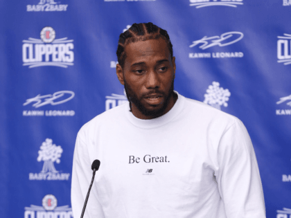 L.A. Clippers Forward Kawhi Leonard celebrates donation of One Million backpacks from Baby