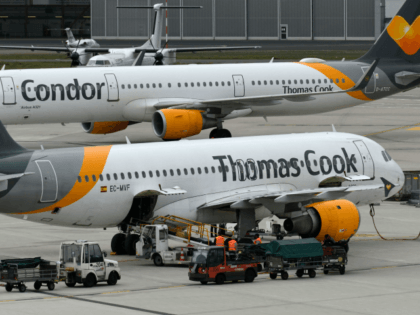 An airplane of British tour operator Thomas Cook (front) and another one of Condor, the German airline subsidiary of the British travel giant, are seen on September 24, 2019 at the airport in Duesseldorf, western Germany. - As British tour operator Thomas Cook declared bankruptcy, some 600,000 tourists from around …