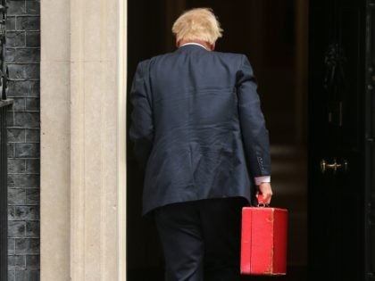 Britain's Prime Minister Boris Johnson arrives at 10 Downing Street in central London